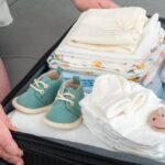 A collection of essential baby travel feeding items neatly arranged for a trip.