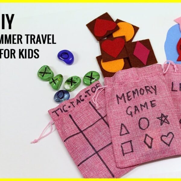 Handmade toddler travel games arranged neatly for a peaceful flight in an airplane cabin.