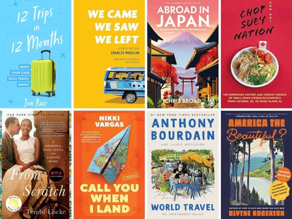 A selection of travel-themed picture books displayed on a wooden table in a sunny room.