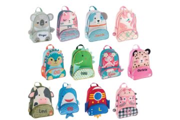 A variety of cute animal-themed toddler backpacks displayed in a bright, modern nursery.