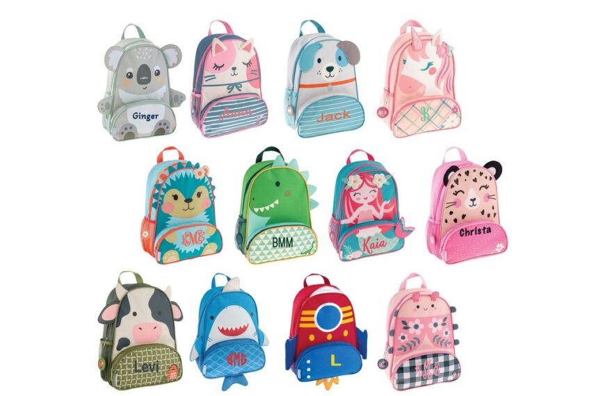 A variety of cute animal-themed toddler backpacks displayed in a bright, modern nursery.