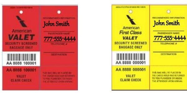 Assorted gate-check tags arranged on a wooden workbench in soft light