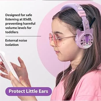 Toddler wearing earplugs on airplane holding stuffed animal